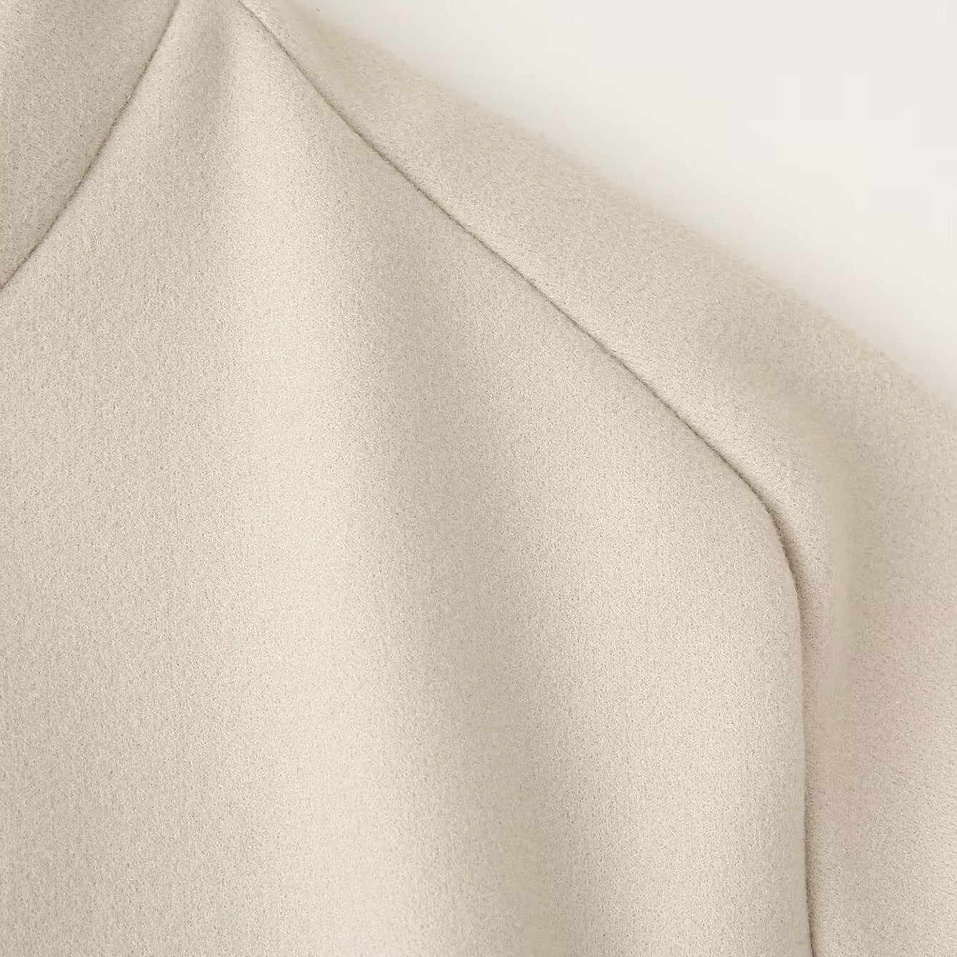 Beige ribbed high-neck sweater in Langry single breasted jacket