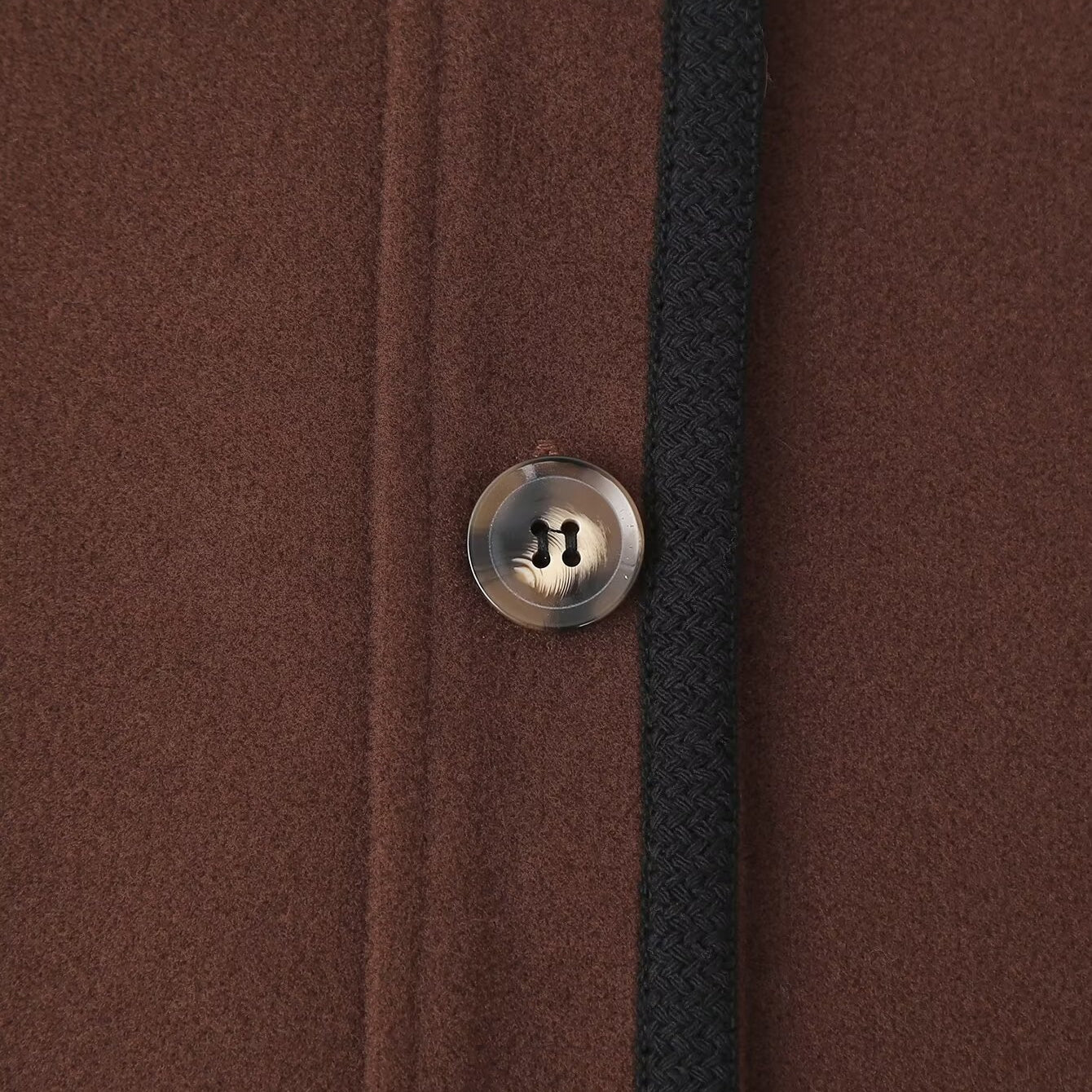 Stylish graceful soft woolen langry fashion jacket in brown leather with silver buttons and black strap