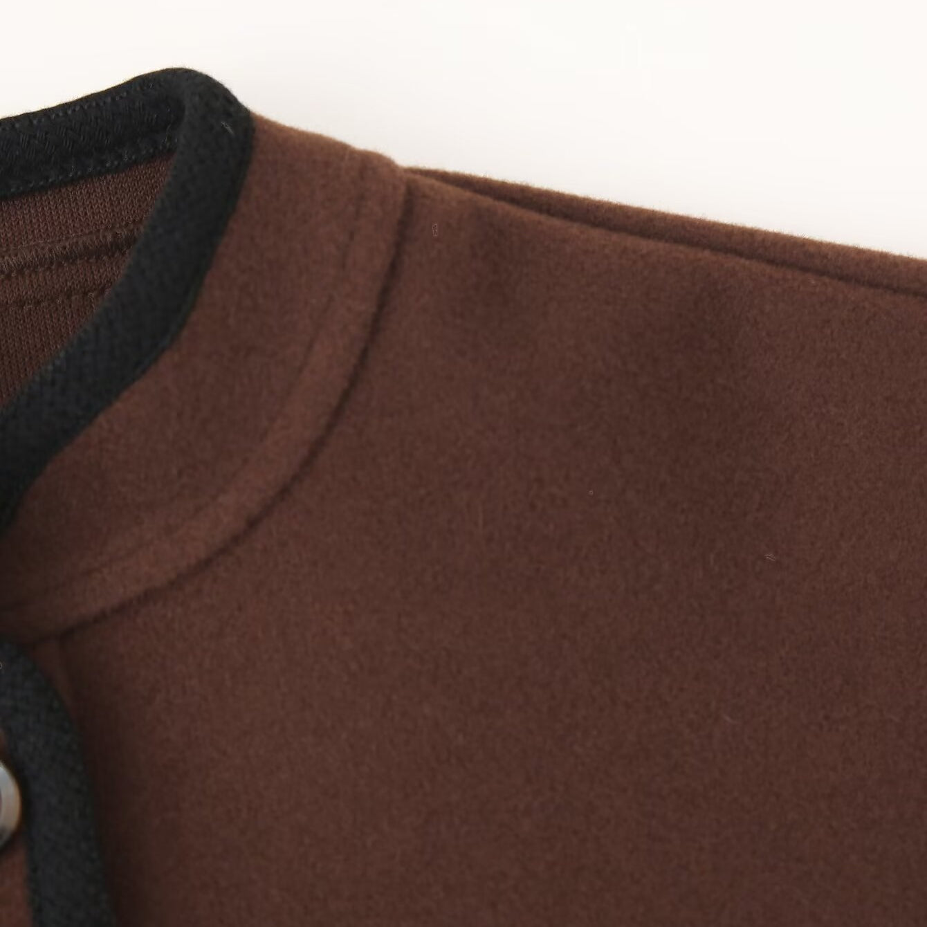 Stylish graceful soft woolen langry fashion brown turtleneck jacket with black trim