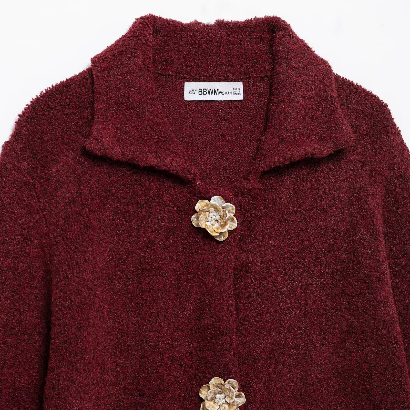 Elegant knitted cardigan in burgundy boucle with floral buttons and collar detail, langry fashion ملابس