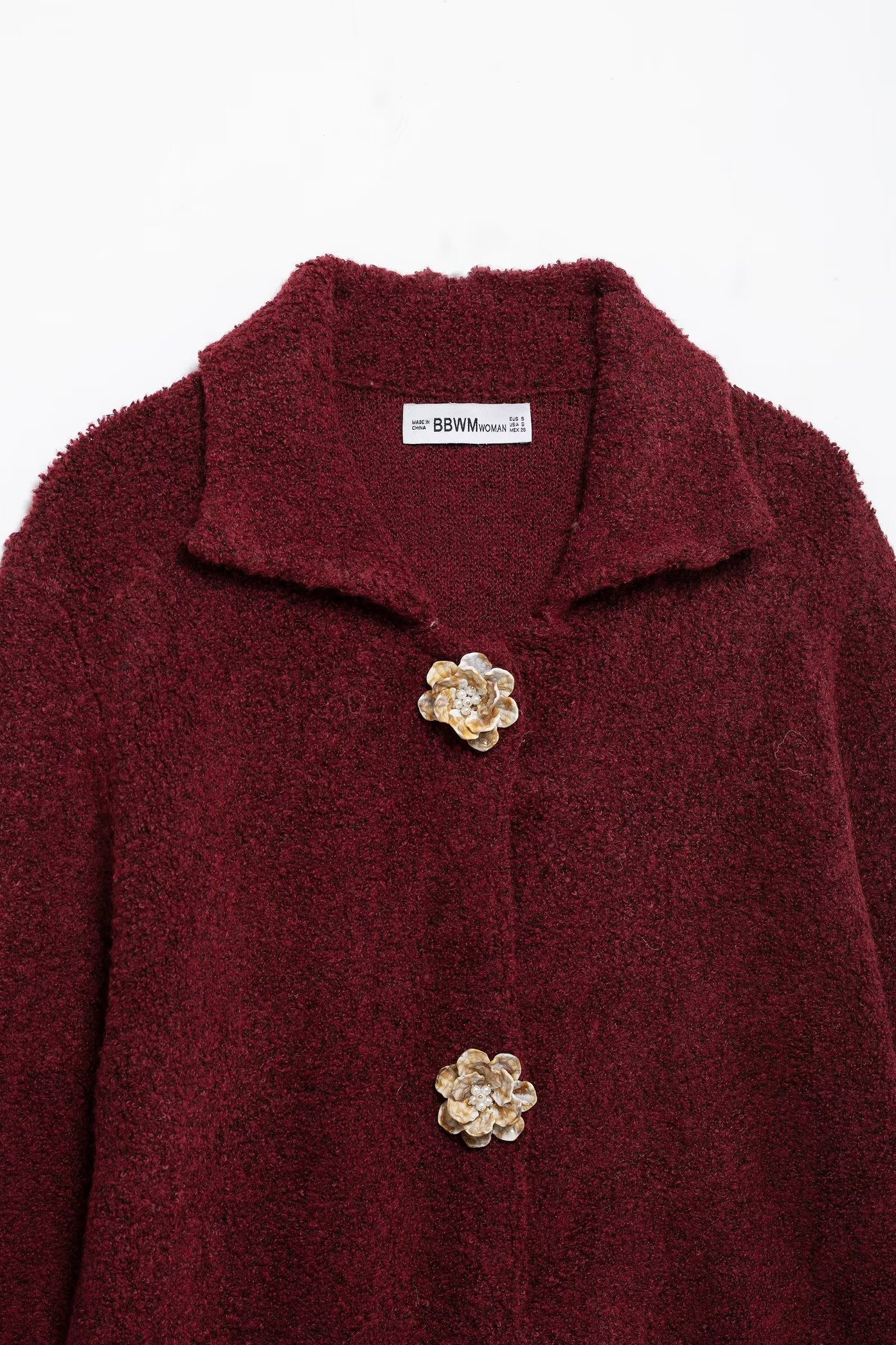 Elegant knitted cardigan in burgundy boucle with floral buttons and collar detail, langry fashion ملابس