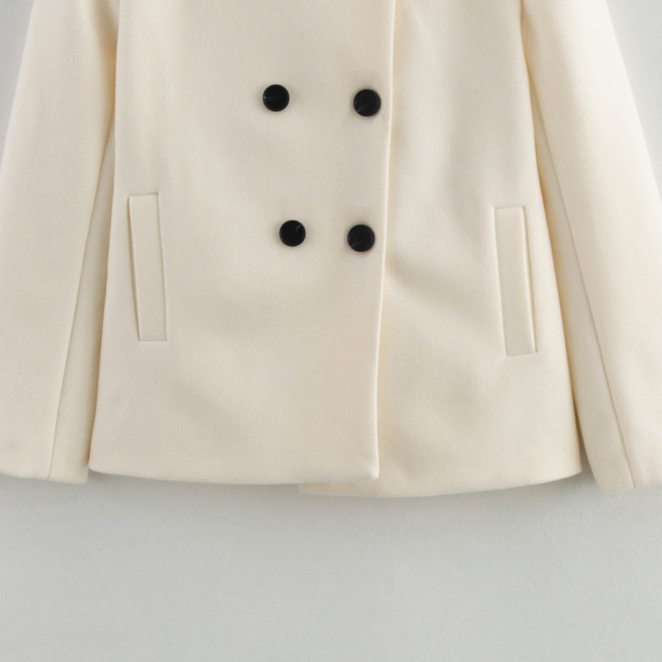 Cream double-breasted woolen coat with black buttons, Langry fashion ملابس