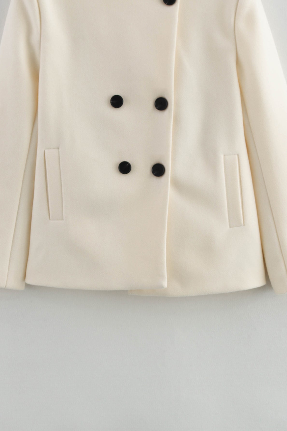 Cream double-breasted woolen coat with black buttons, Langry fashion ملابس