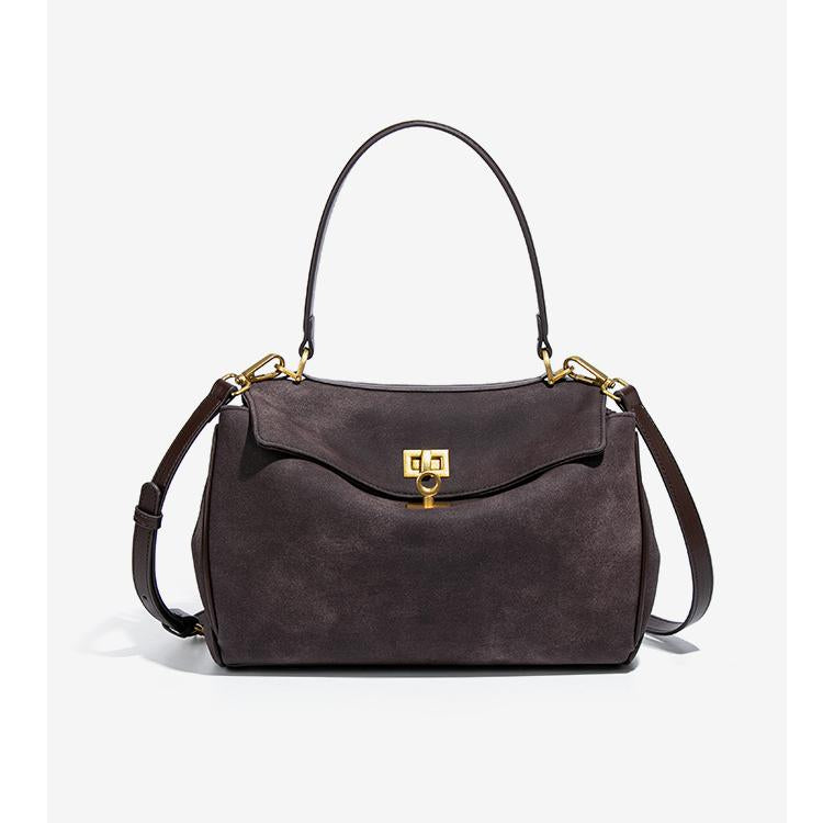 Brown suede handbag with gold hardware, ideal for stylish fashion outfits