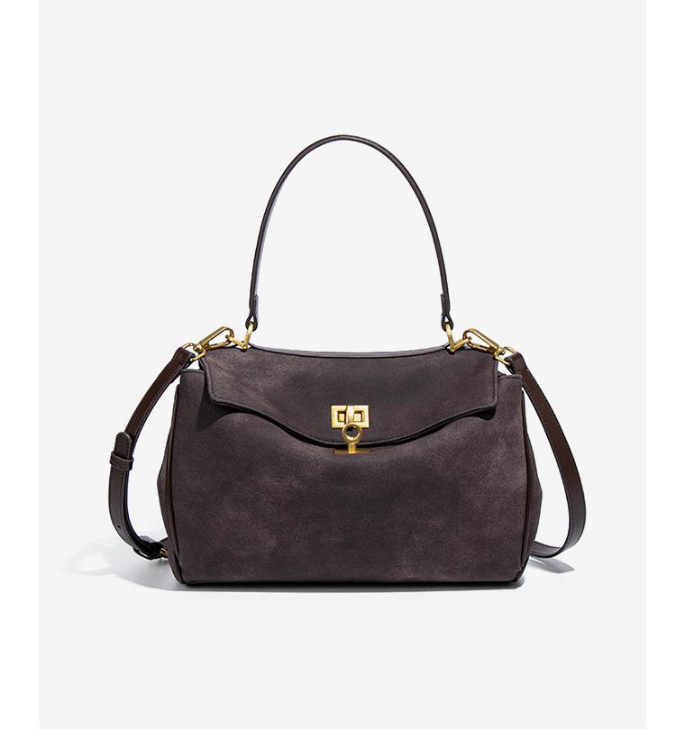 Brown suede handbag with gold hardware, ideal for stylish fashion outfits