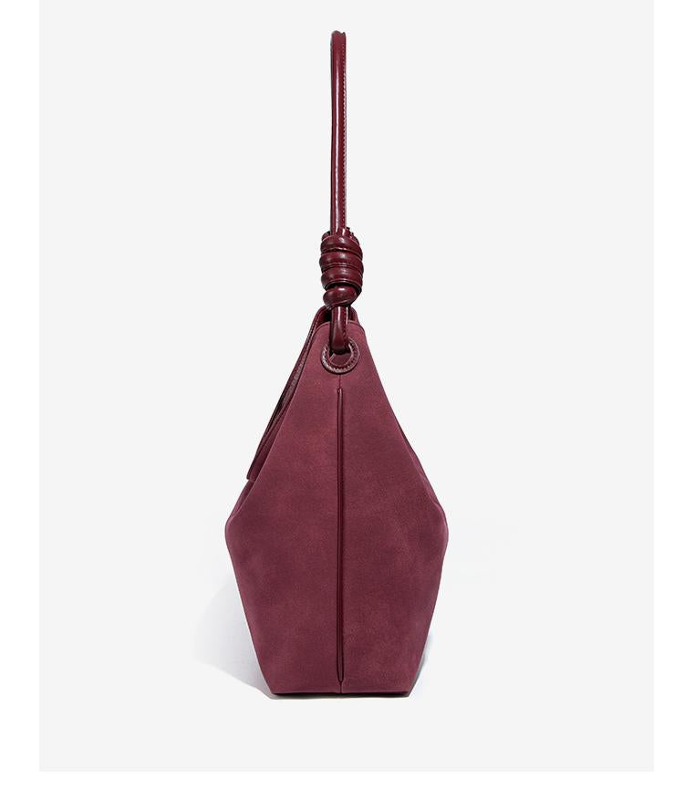 Luxury Frosted Office Bucket Bag showcases a maroon leather handbag with knotted handle for sophisticated fashion style