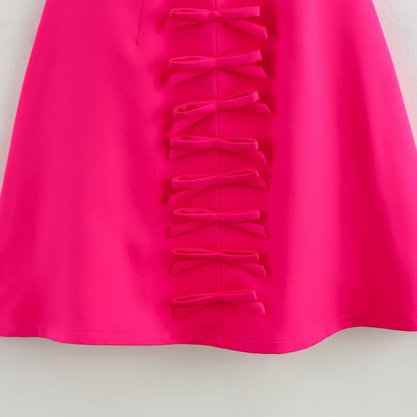 Bright pink Stereo Bowknot Decoration Dress with bow accents, perfect for stylish fashion wear