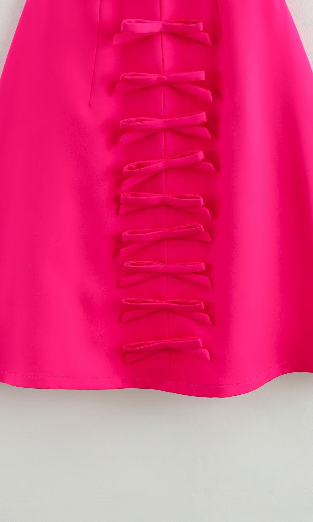 Bright pink Stereo Bowknot Decoration Dress with bow accents, perfect for stylish fashion wear