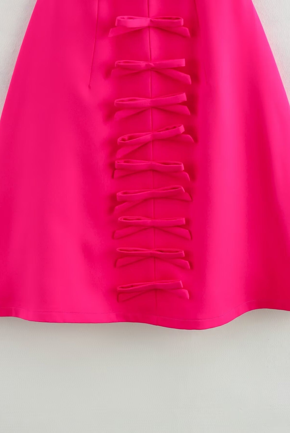 Bright pink Stereo Bowknot Decoration Dress with bow accents, perfect for stylish fashion wear