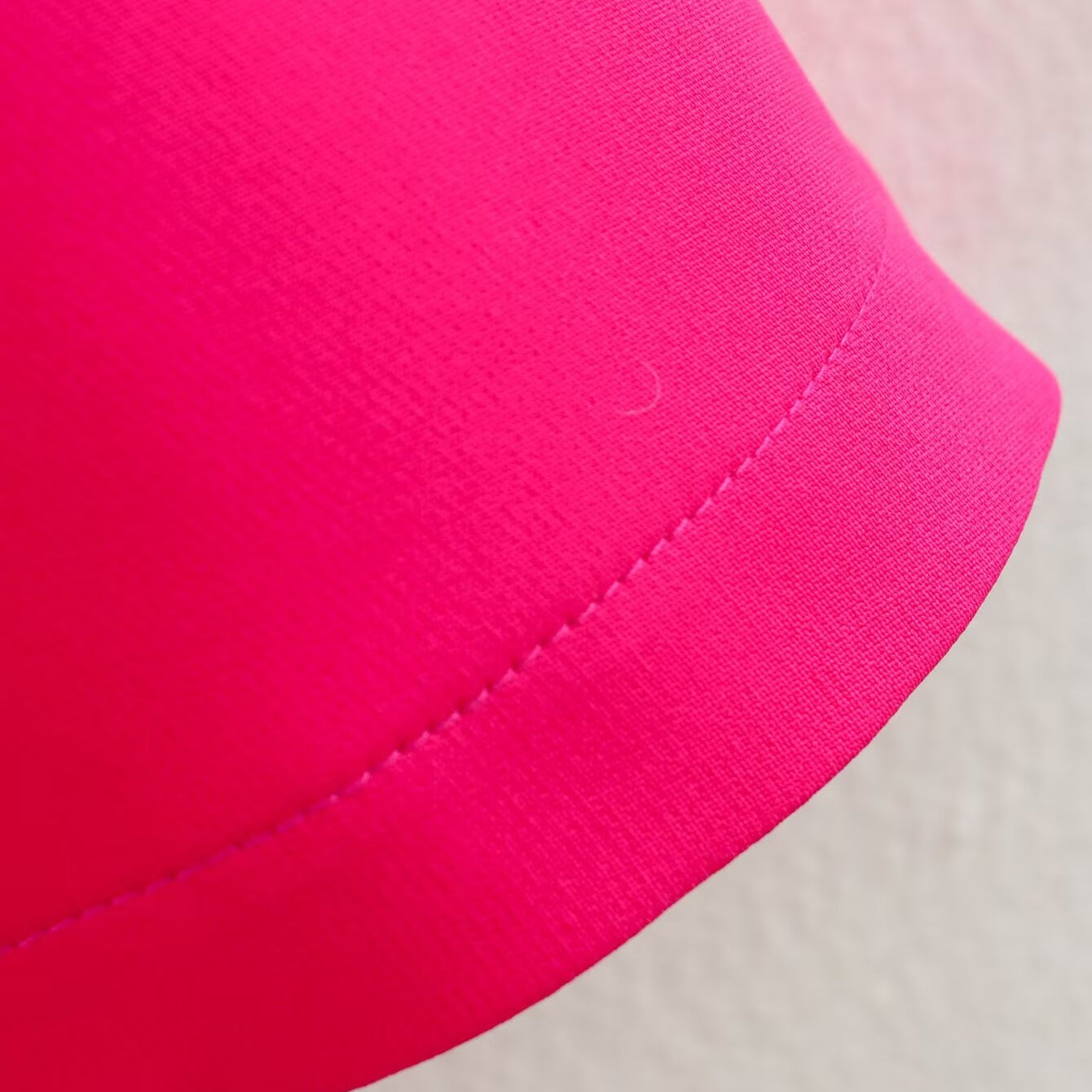 Bright pink fabric with stitched hem on the Stereo Bowknot Decoration Dress for stylish ملابس