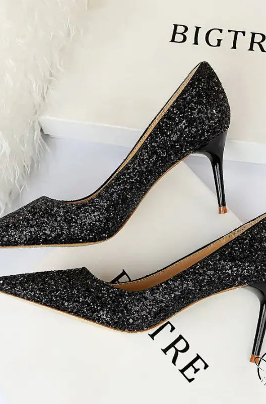 Sparkly black high heels in Langry fashion sequin stiletto style