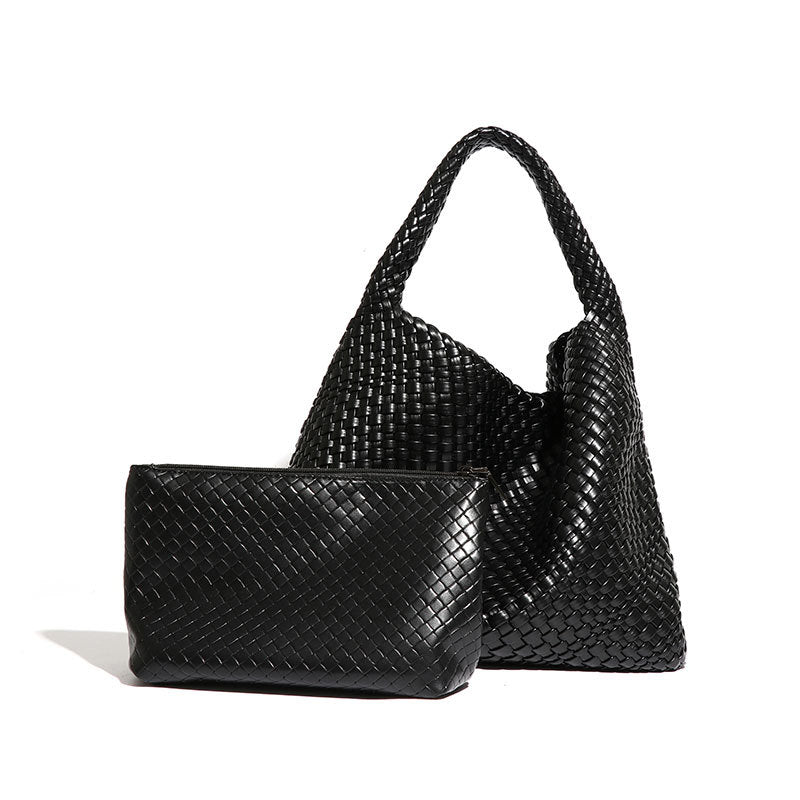 Black woven leather handbag and pouch featured in Handmade Woven Bag for fashion enthusiasts