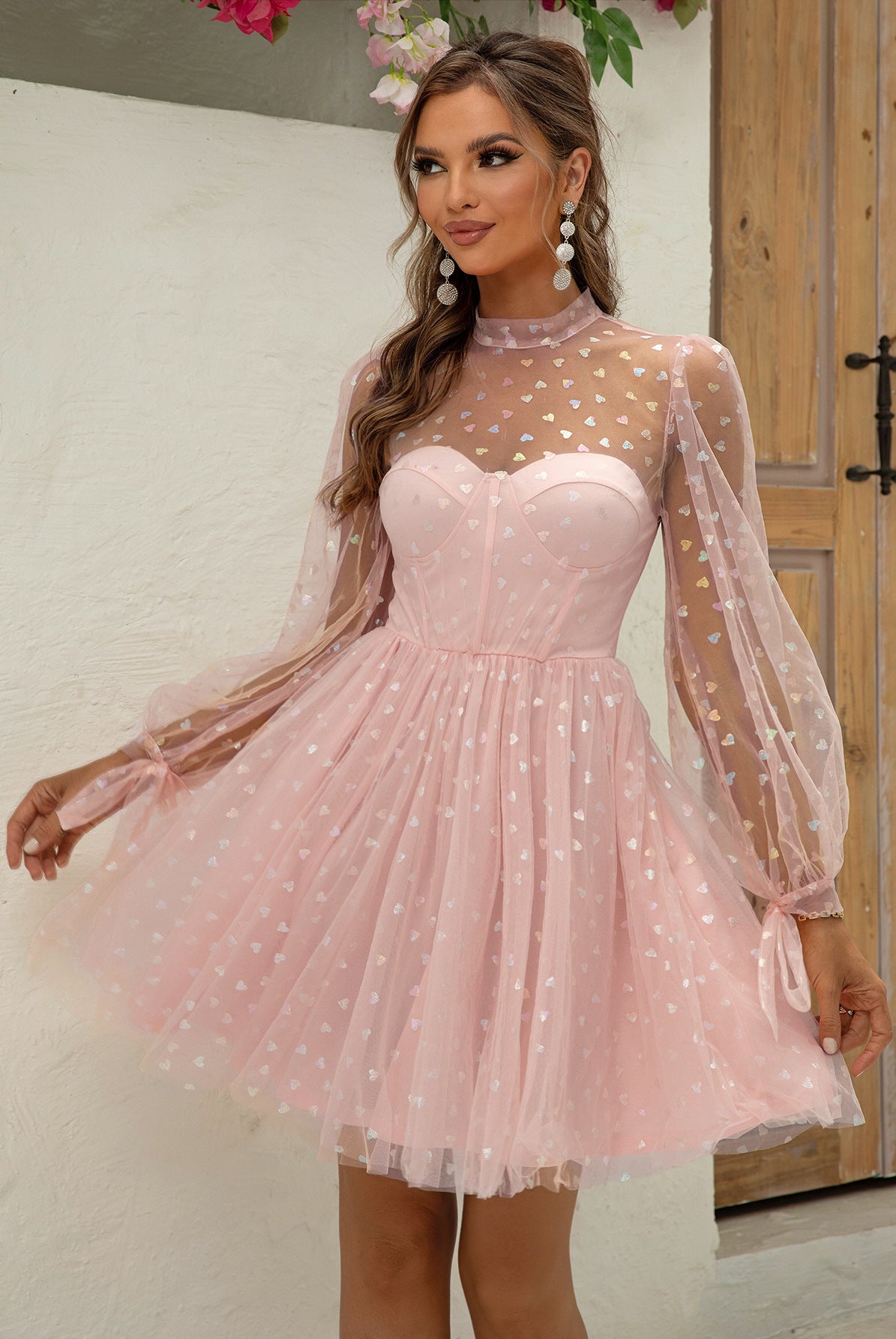 Elegant Barbie Dress featuring a pink tulle party dress with sheer polka dot sleeves