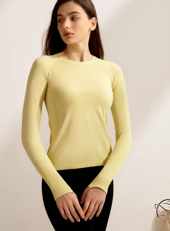 Pale yellow langry fashion running top with long sleeves and crew neck