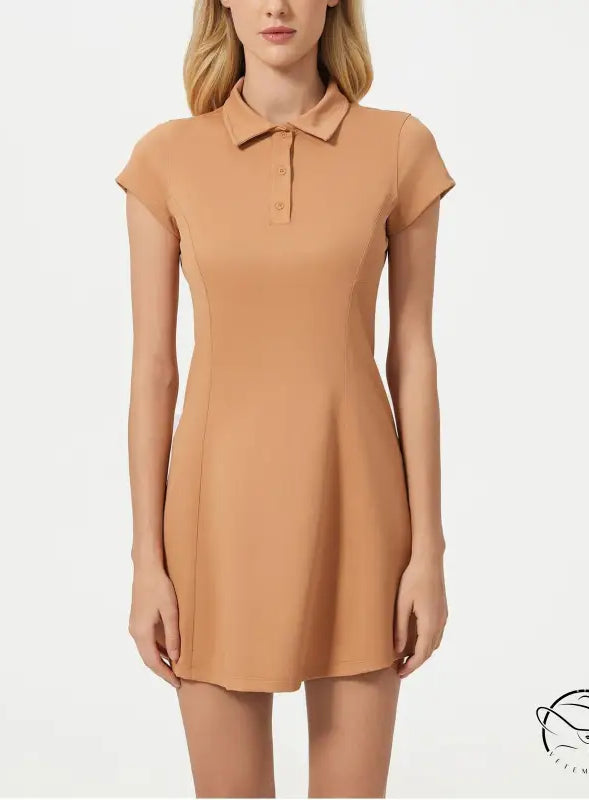 Breathable short tennis dress in peach with collared neckline