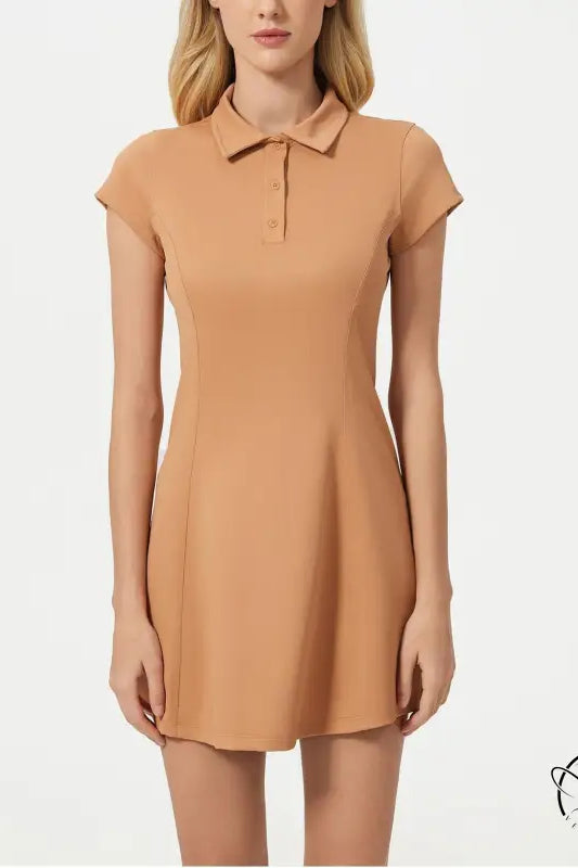Breathable short tennis dress in peach with collared neckline