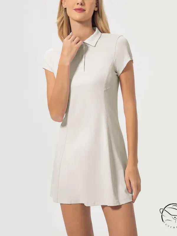 Breathable short tennis dress in white polo style with short sleeves