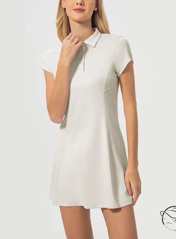 Breathable short tennis dress in white polo style with short sleeves