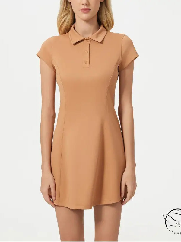 Breathable short tennis dress in peach with collared neckline