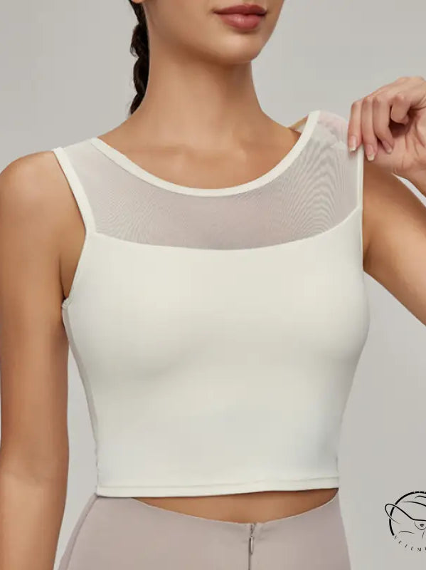 Beauty Back mesh workout top with sleeveless design and mesh yoke