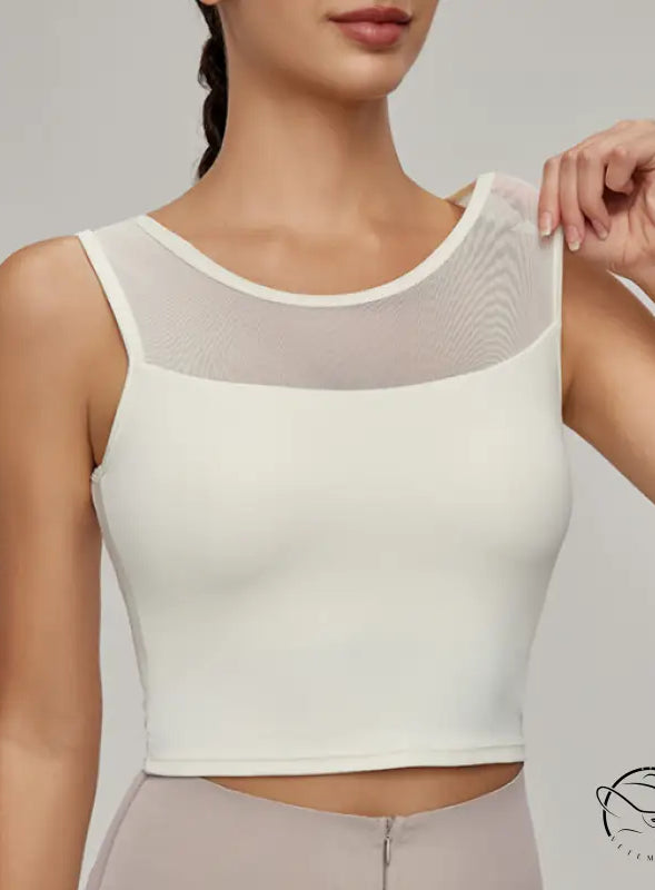 Beauty Back mesh workout top with sleeveless design and mesh yoke