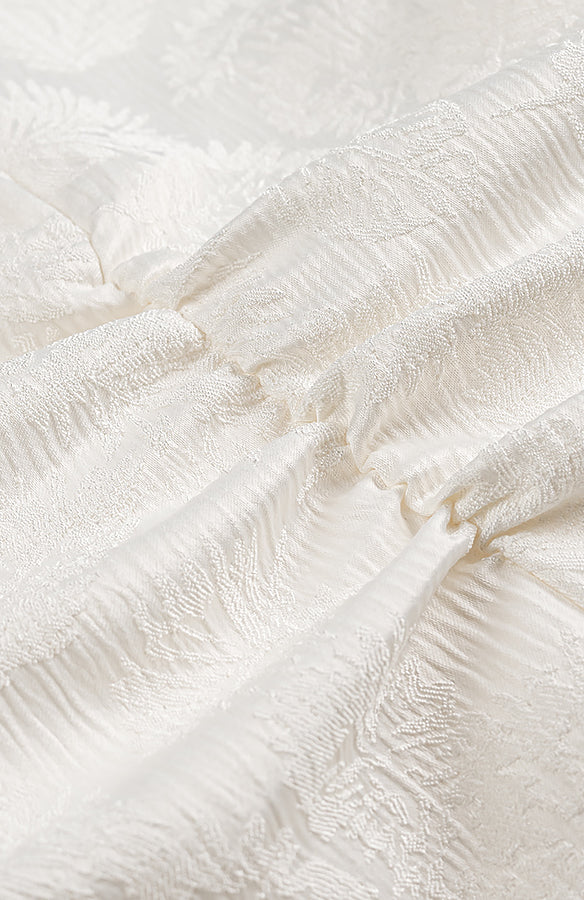 Cream lace fabric with floral patterns in Langry V-neck jacquard dress