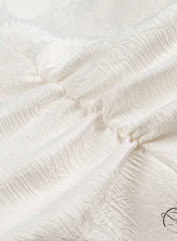 Cream lace jacquard fabric with floral patterns in langry fashion dress