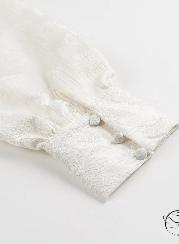 Langry fashion white fur coat with pom-poms on V-neck jacquard dress