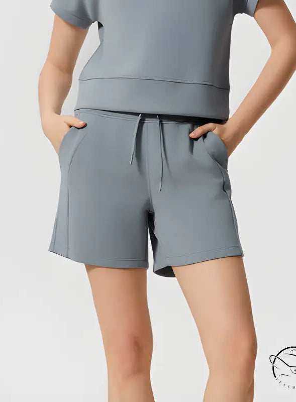 Gray casual loose yoga shorts with drawstring waist and side pockets