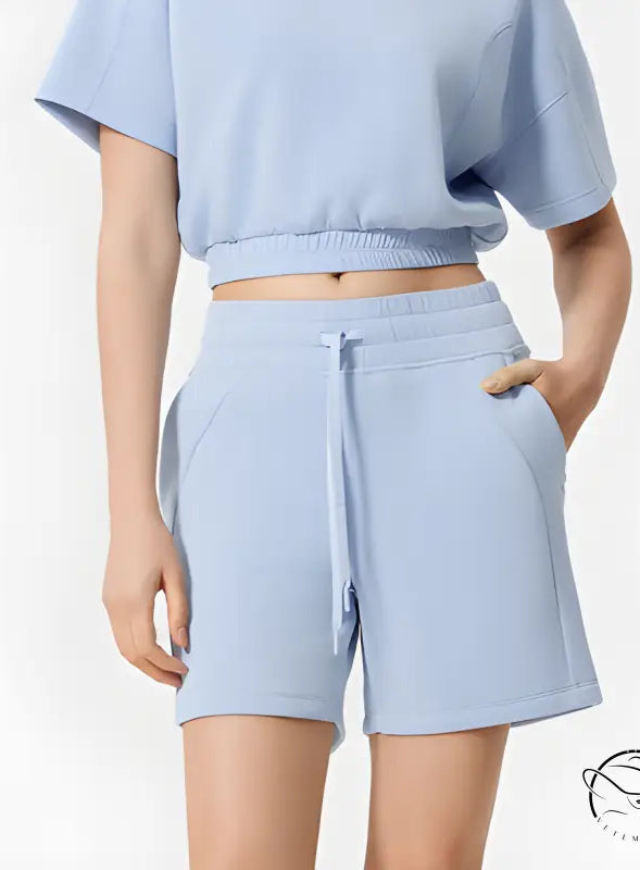 Light blue casual loose yoga shorts with elastic waistband and pockets