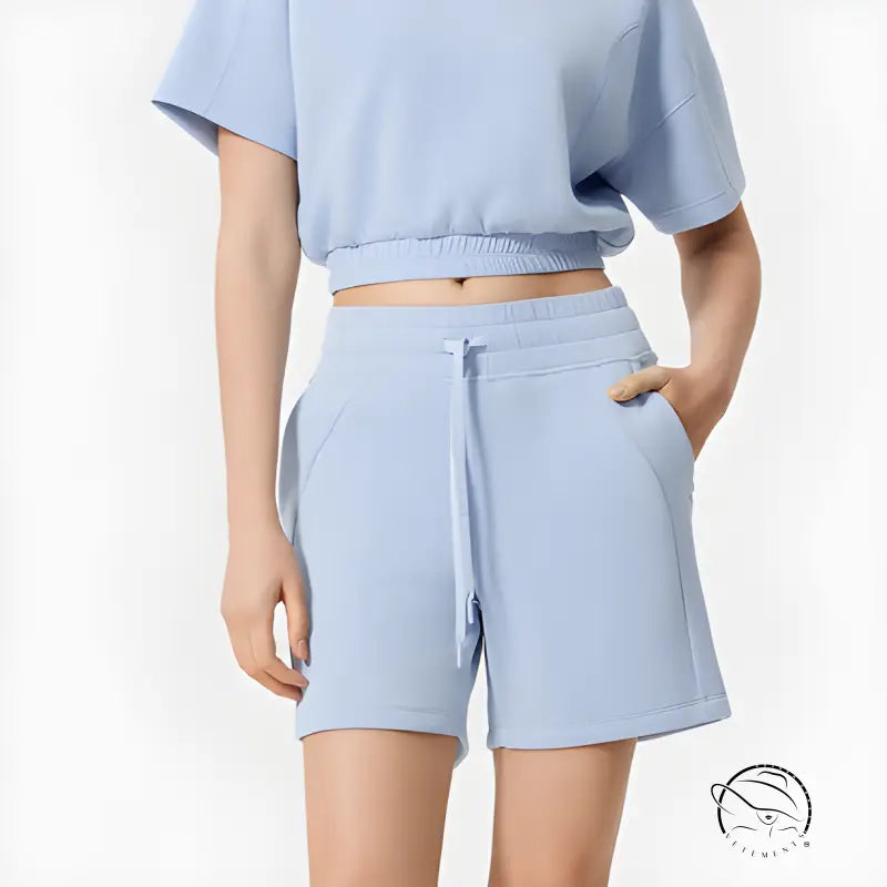 Light blue casual loose yoga shorts with elastic waistband and pockets