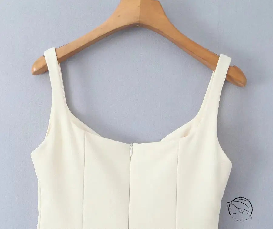 Stunning retro backless dress with white langry fashion top on wooden hanger