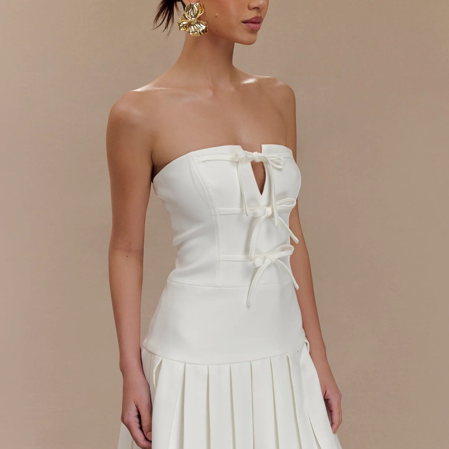 White strapless mini dress from Enchanting A Line Pleated Dress collection in fashion ملابس