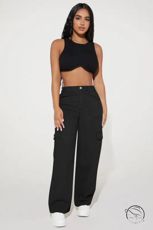 Woman in black crop top and cute casual pants