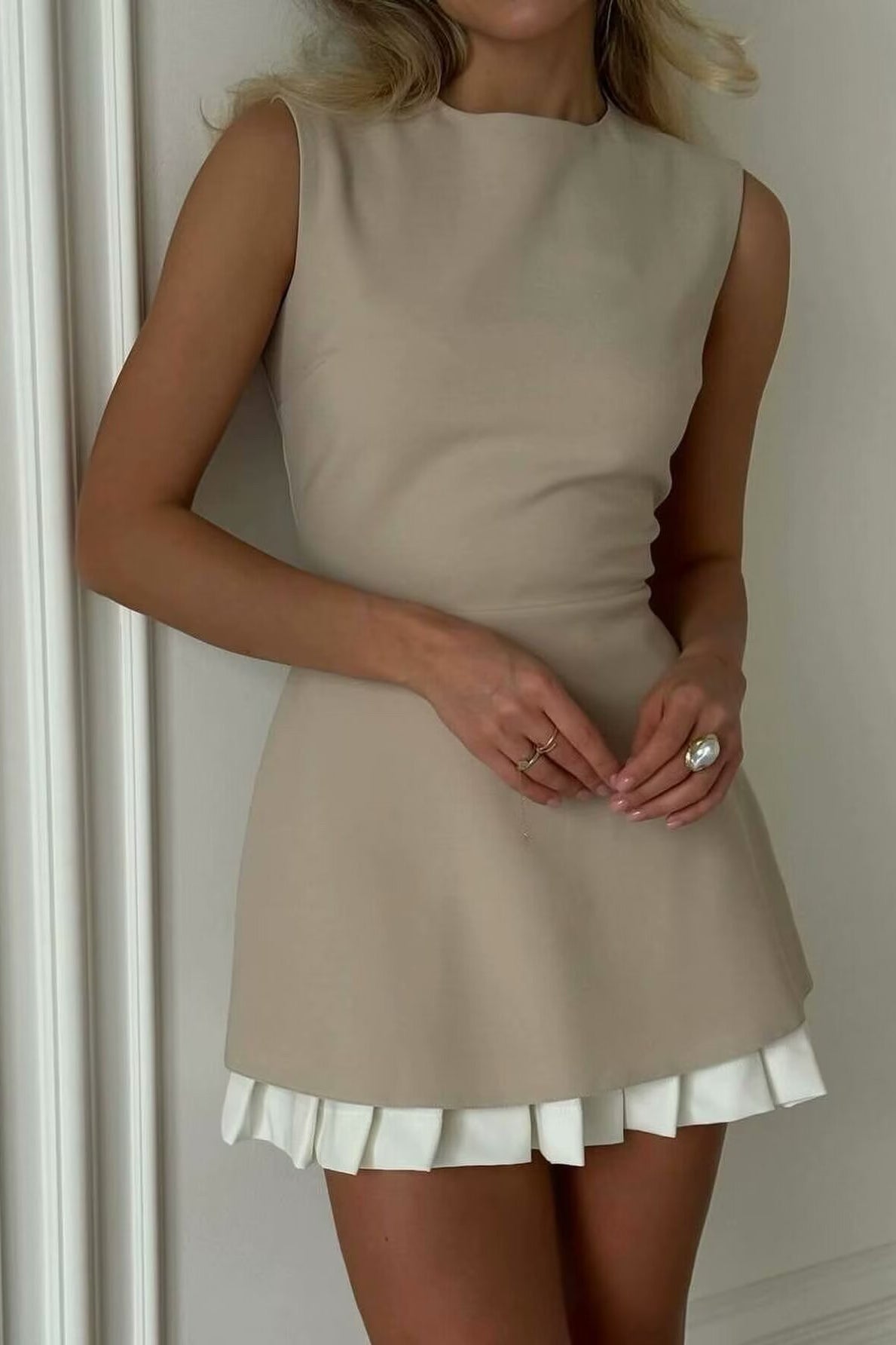 Elegant beige sleeveless Langry fashion dress with white ruffled hem