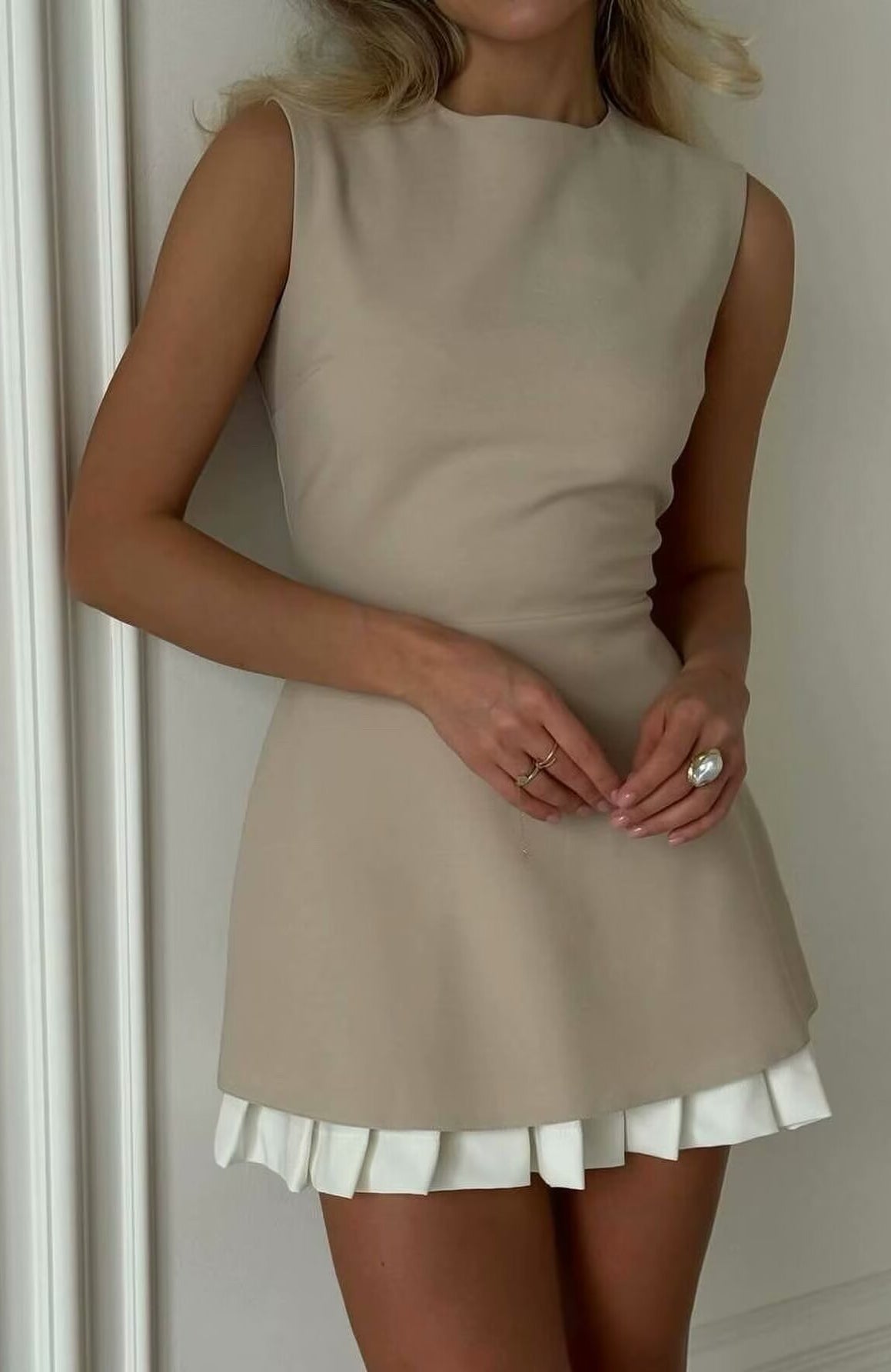 Elegant beige sleeveless Langry fashion dress with white ruffled hem