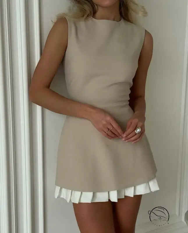 Elegant beige sleeveless langry fashion dress with white ruffled hem
