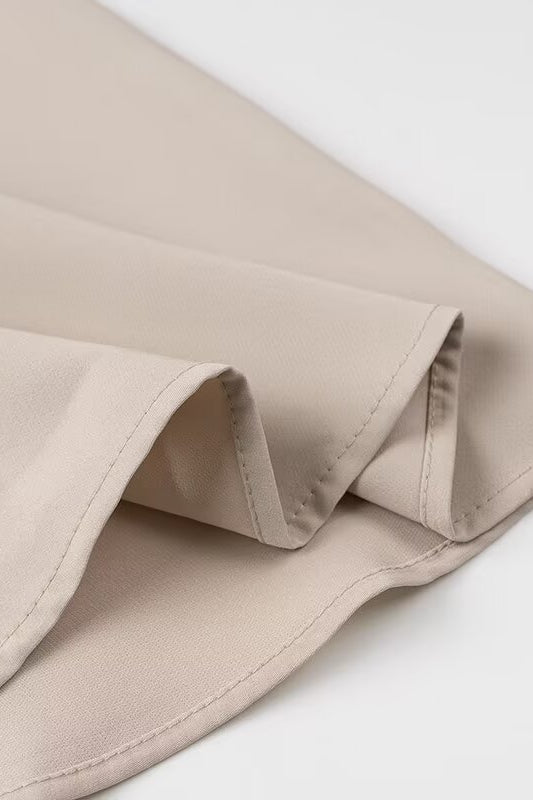 Elegant langry beige satin skirt with ruffled hem in fashion two-piece set