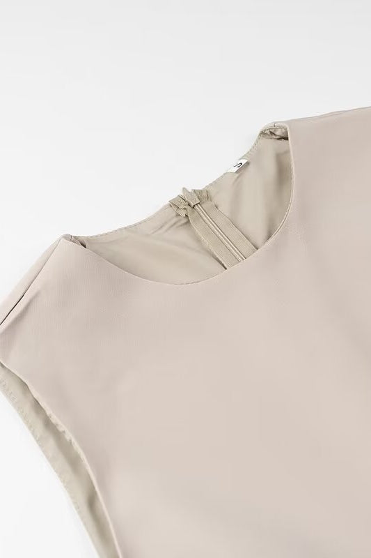 Elegant beige sleeveless langry fashion blouse with ruched neckline
