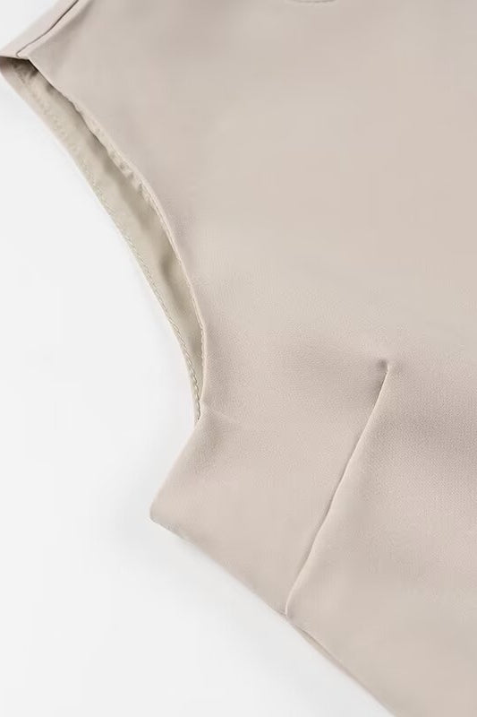 Elegant Langry fashion beige sleeveless top with high neckline