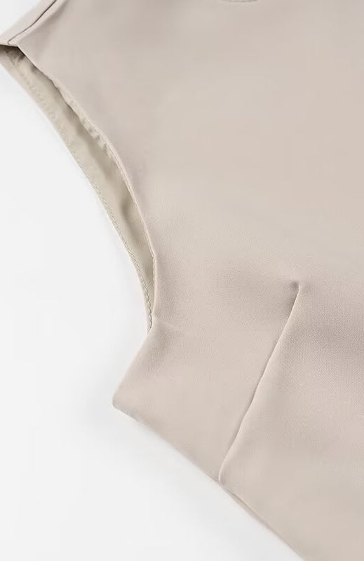 Elegant Langry fashion beige sleeveless top with high neckline