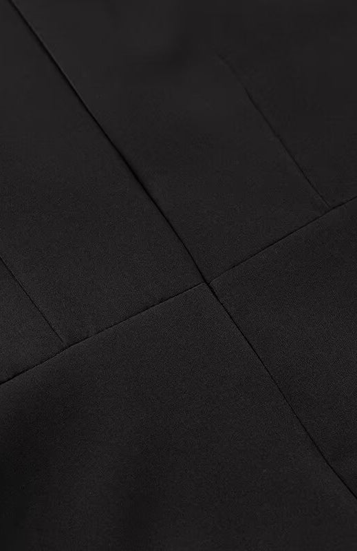 Elegant langry black satin fashion dress with pleated skirt and fitted bodice