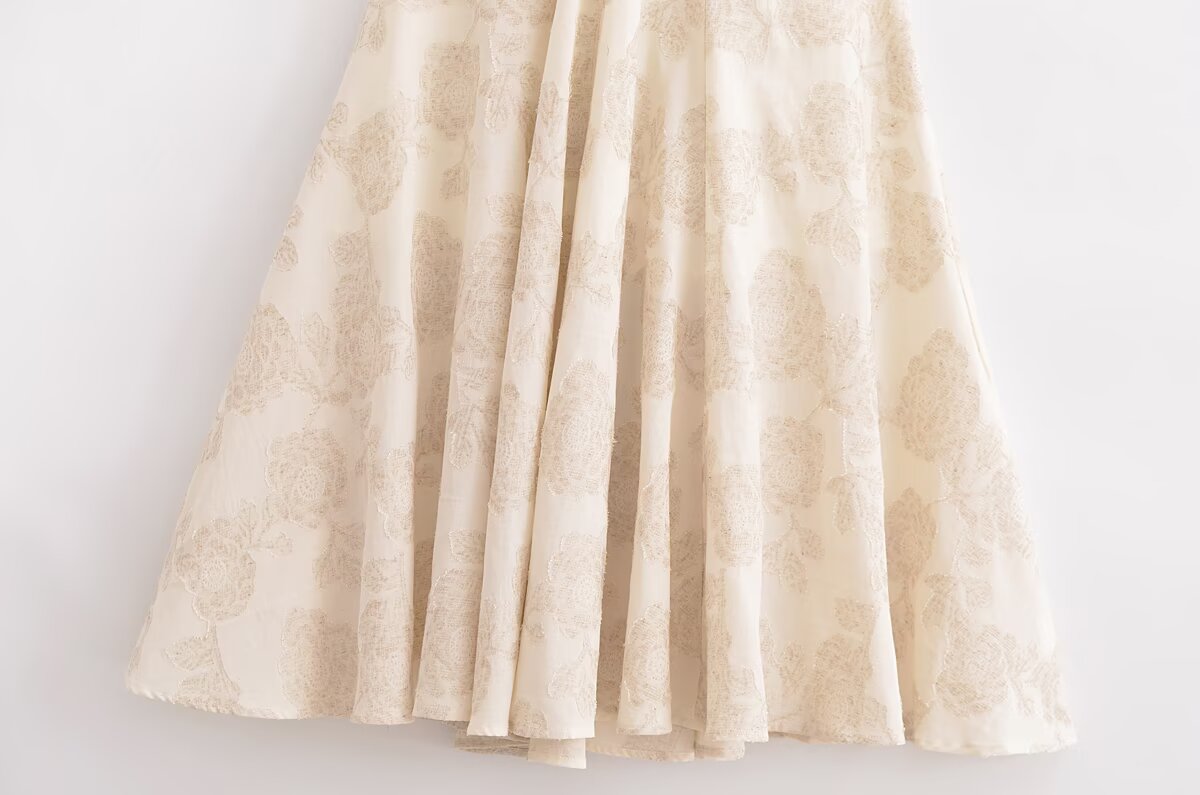 Cream-colored floral skirt of Elegant Sling French Design Dress, showcasing Langry fashion ملابس