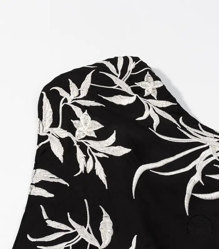 Black and silver floral scarf with metallic accents on langry fashion dress