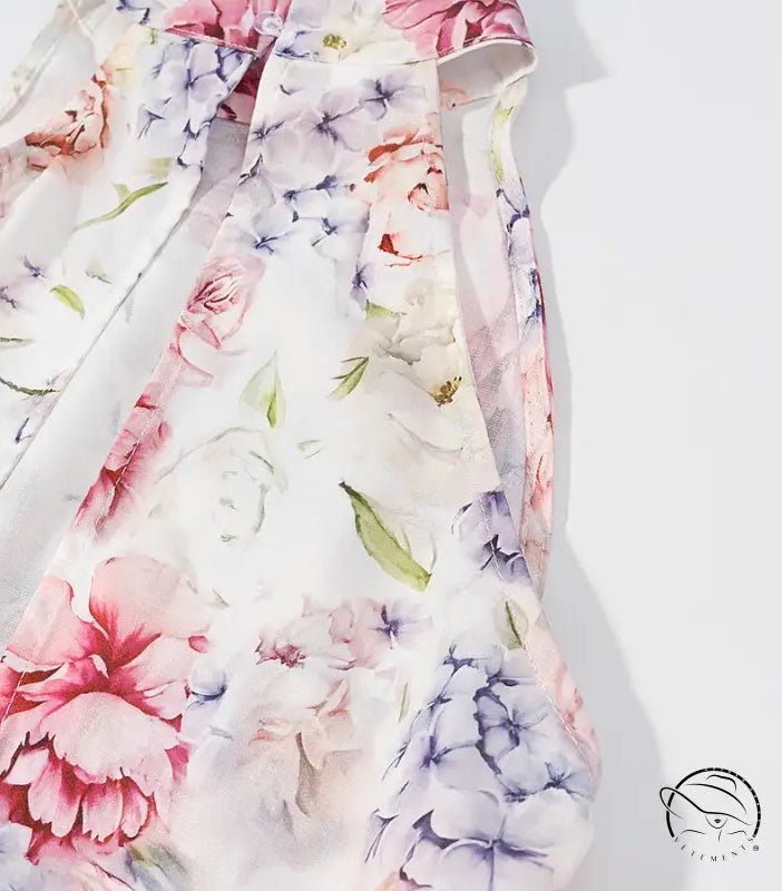 Madewell floral print chiffon blouse with pink purple flowers on white background