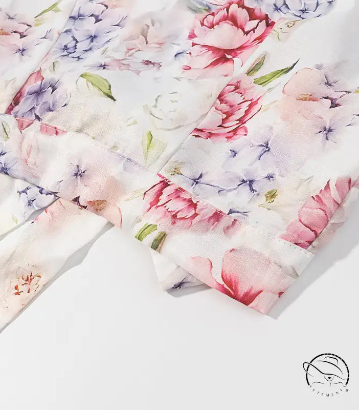 Enchanting floral print leggings with pink, purple, blue flowers on white background, langry fashion ملابس
