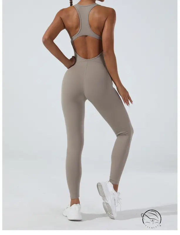 Sleek taupe Langry yoga one-piece jumpsuit in stretchy fashion ملابس