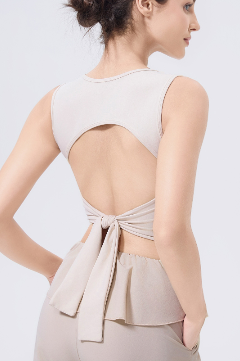 Adjustable shockproof beige open-back outdoor running bra with bow detail