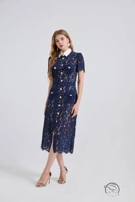 Navy lace pocket summer dress with gold buttons and high heels