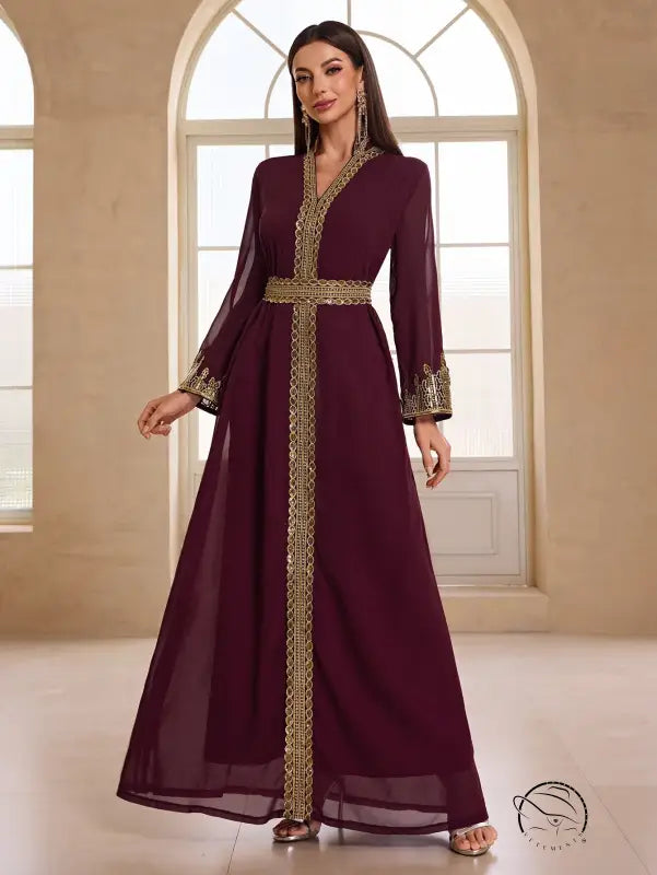 Elegant burgundy chiffon kaftan in Moroccan fashion with gold embroidery